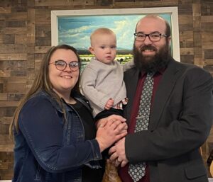 Pastor Jonathan Redd His Wife Megan and Son Sam